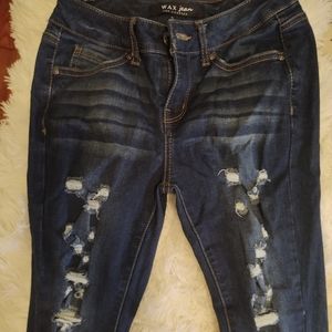 Dark denim distressed jeans